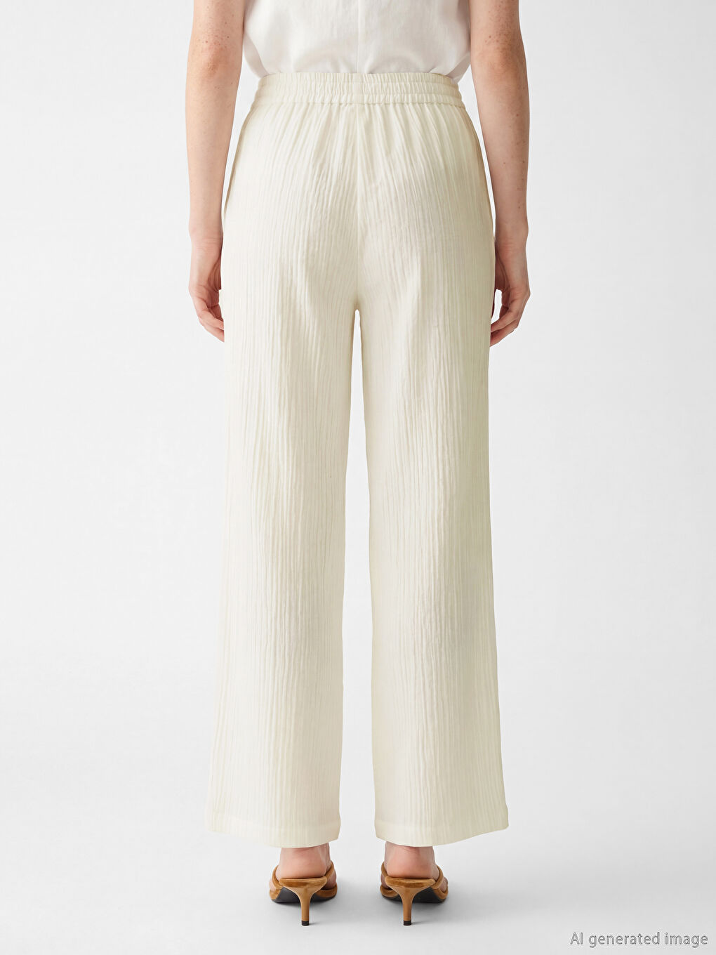 Beyaz Beli Lastikli Dokulu Müslin Kadın Pantolon-3