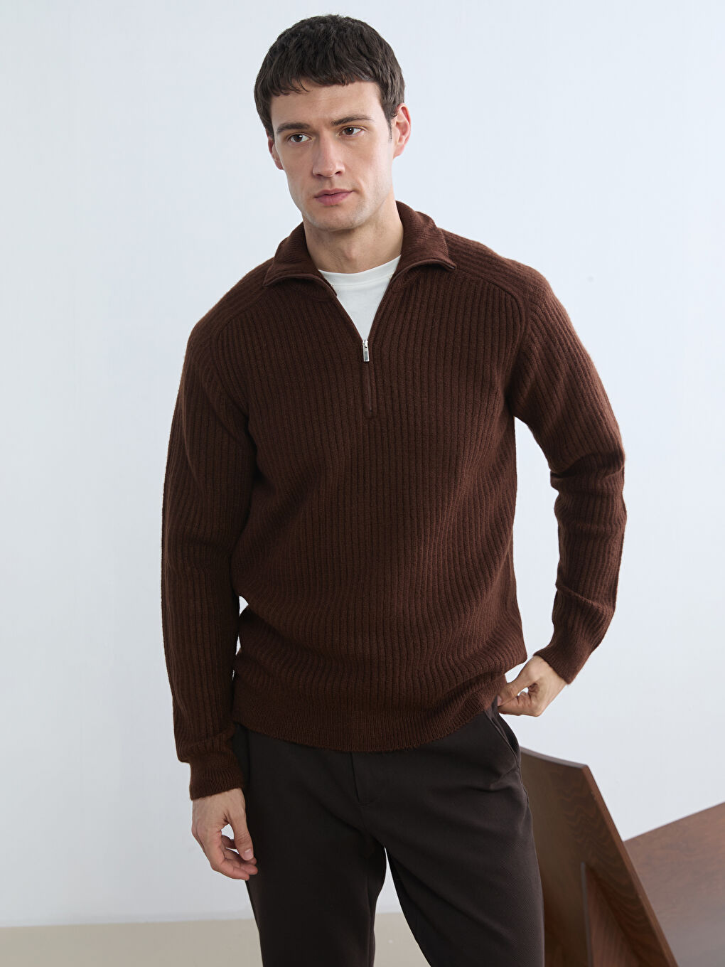 Men's ribbed knit turtleneck sweater.