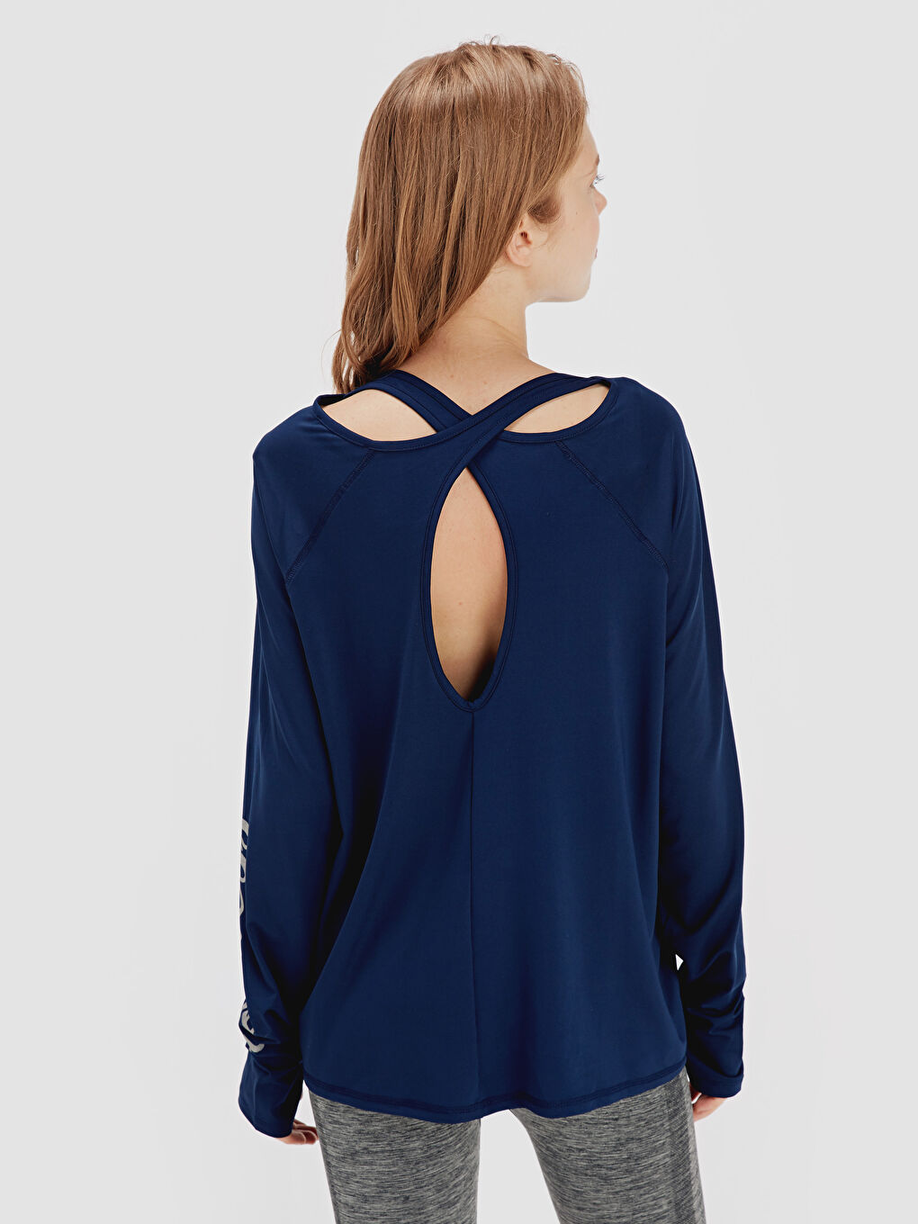 تي شيرت رياضي أزرق نساء-1