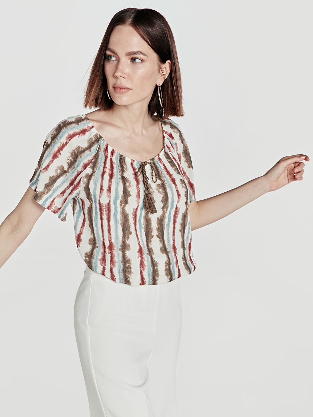 بلوزة كاكي امرأة