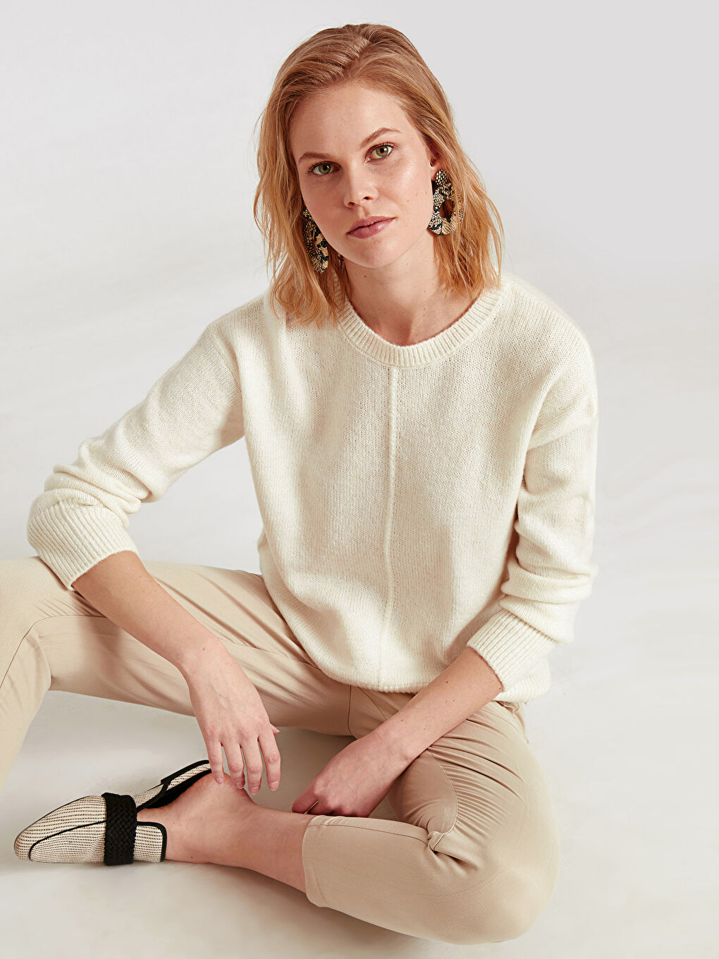 سترة طوبي مصفر نساء