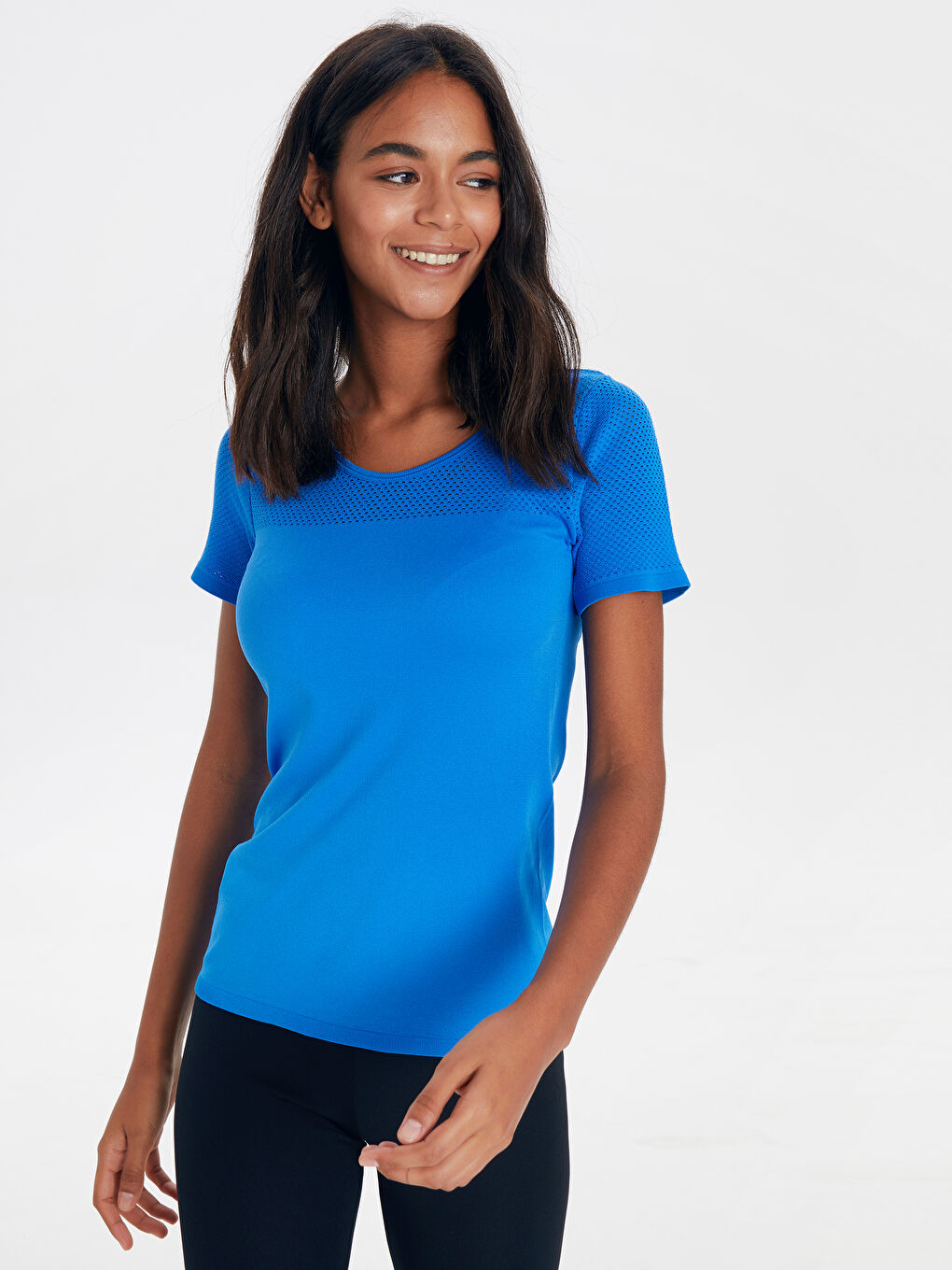 تي شيرت رياضي أزرق فاتح نساء-1