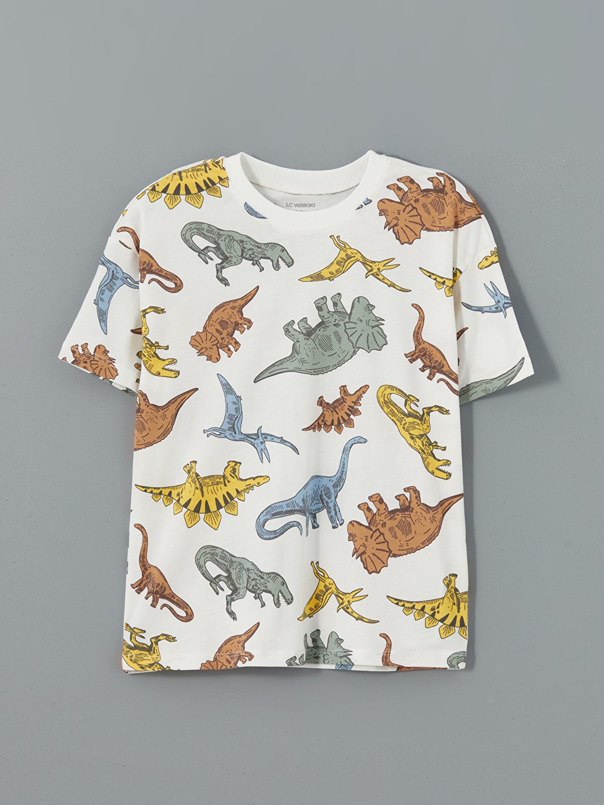 LCW Kids Ekru Bisiklet Yaka Dinozor Baskılı Erkek Çocuk Tişörtü