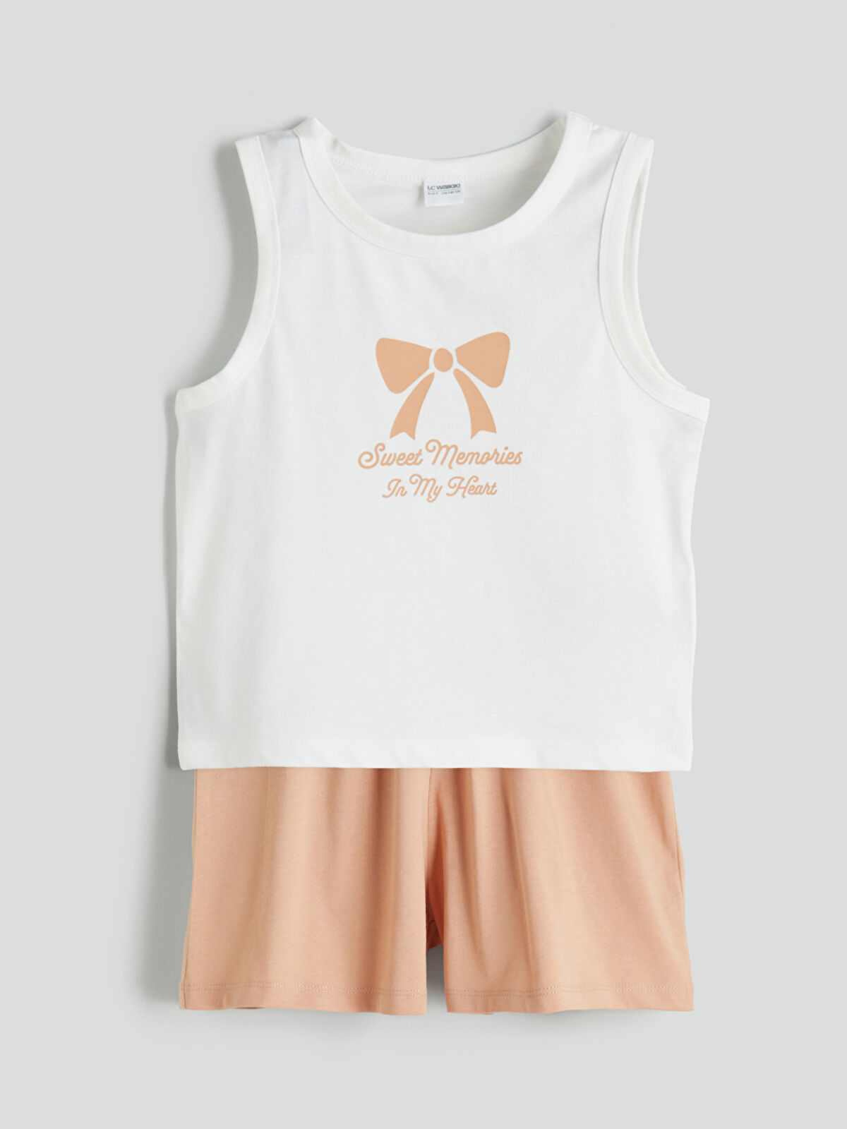 LCW Kids Bisiklet Yaka Fiyonk Baskılı Kız Çocuk Şortlu Pijama Takım