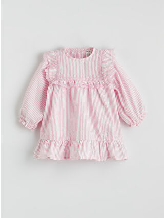 لون مرجاني باهت مخطط