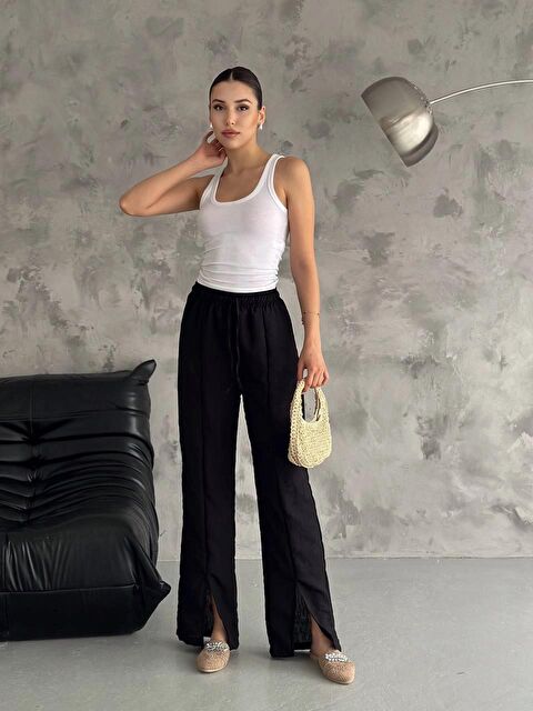 Hazelin Kadın Siyah Lastikli Bel Yırtmaç Detaylı Cepsiz İthal Keten Astarsız Pantolon HZL24S-FRY121941 - S000194801-19351