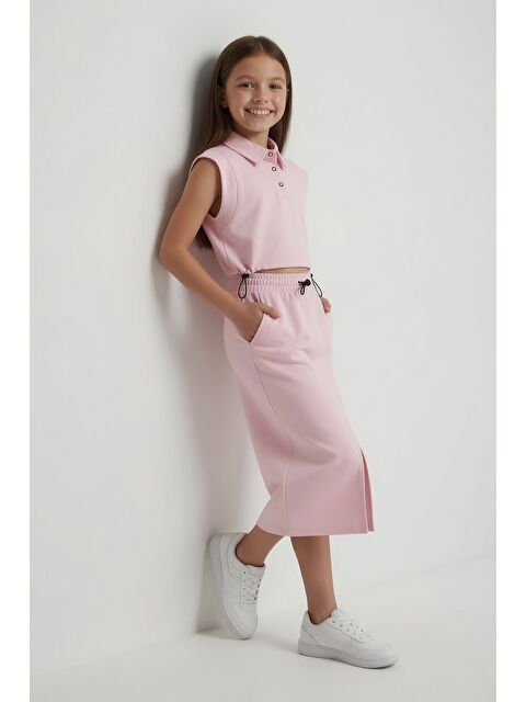 Cansın Mini Pembe Sıfır Kol Crop ve Yırtmaç Detaylı Etekli Kız Çocuk Alt Üst Takım 24005