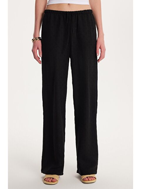 TUDORS Kadın Relax Fit Beli Lastikli Bağlamalı Palazzo Geniş Paça Siyah Pantolon - S000522897-19351