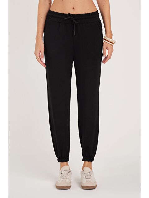 TUDORS Kadın Relax Fit Rahat Kesim Modal Kumaş Beli Bağlamalı Lastikli Jogger Siyah Eşofman Altı - S000521369-19351