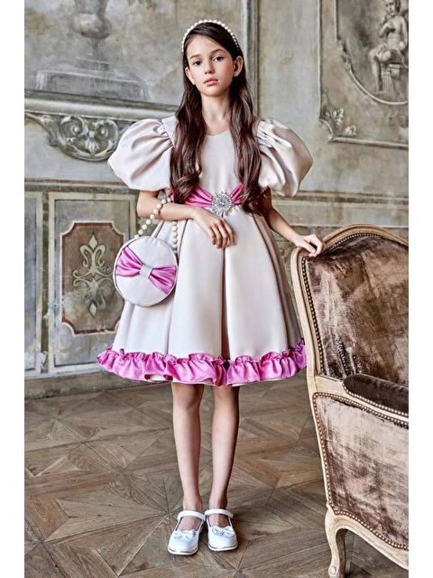 Riccotarz Kız Çocuk Balon Kollu Belinde Broş ve Kemer Detaylı Etek Ucu Fırfırlı Bej Abiye