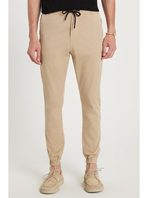 TUDORS Erkek Slim Fit Dar Kesim Pamuklu Normal Bel Lastikli Paça Bej Renk Pantolon - S000519762-19928