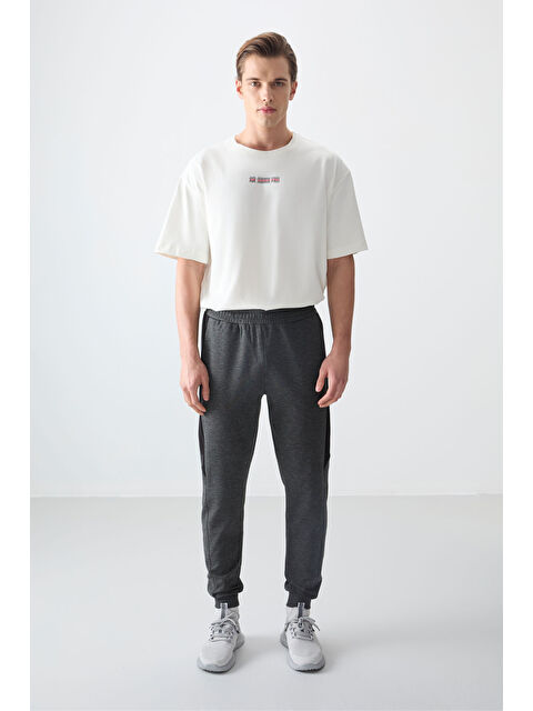 Air Jones Antrasıt Melanj Yüzeyi Dokulu Standart Fit Nakışlı  Eşofman Alt - 82126 - S000203348-29666