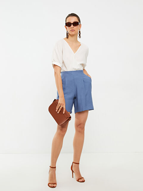 LCWAIKIKI Basic شۆرتی جیبەکان بە وردەکاری کەمەر لاستیکی ڕاست بۆ ژنان - S2CI85Z8-KZZ