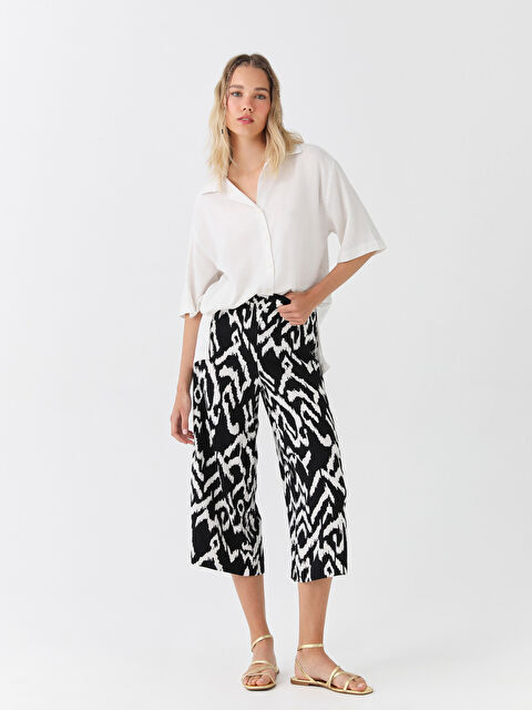 LCW Vision پانتۆڵی کاپری بۆ ژنان بە كمرێکی گەنجاو و نەخشدار و دەركەوتنی كەتان - S3HK70Z8-SW8