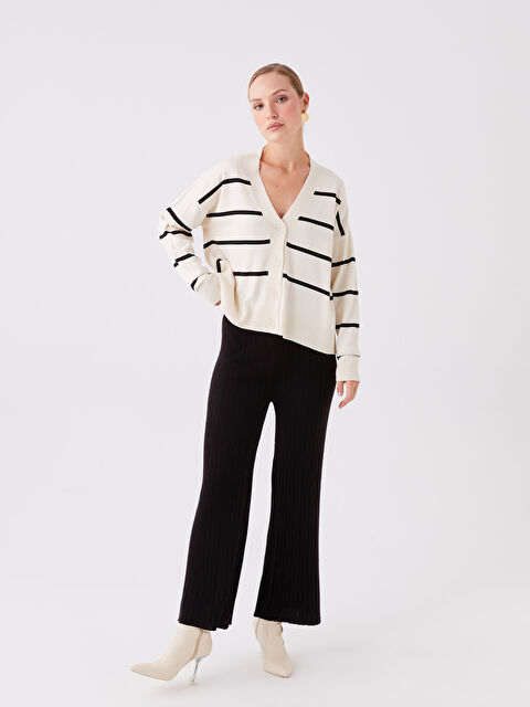 LCWAIKIKI Classic Beli Lastikli Düz Geniş Paça Kadın Triko Pantolon - W3AI55Z8-CVL