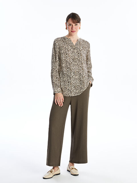 LCW Grace Beli Lastikli Düz Geniş Paça Kadın Pantolon - S4I810Z8-R0B