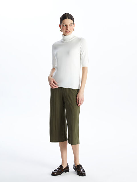 LCWAIKIKI Basic بنطال كابري سادة بخصر مطاطي للسيدات - S4IM88Z8-HDA