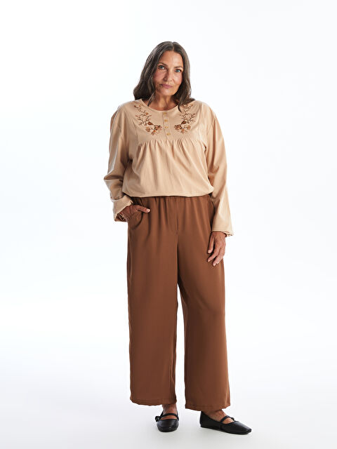 LCW Grace Beli Lastikli Düz Geniş Paça Kadın Pantolon - W47751Z8-HMZ