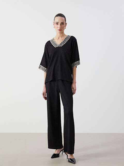 LCWAIKIKI Classic Beli Lastikli Dokulu Kadın Pantolon - S5AI78Z8-CVL