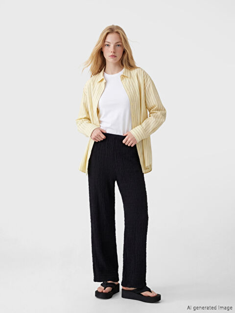 XSIDE Beli Lastikli Dokulu İspanyol Paça Kadın Pantolon