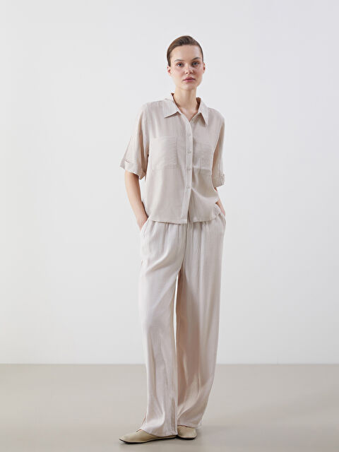 LCWAIKIKI Classic Beli Lastikli Dokulu Geniş Paça Kadın Pantolon - S5KQ96Z8-FHL