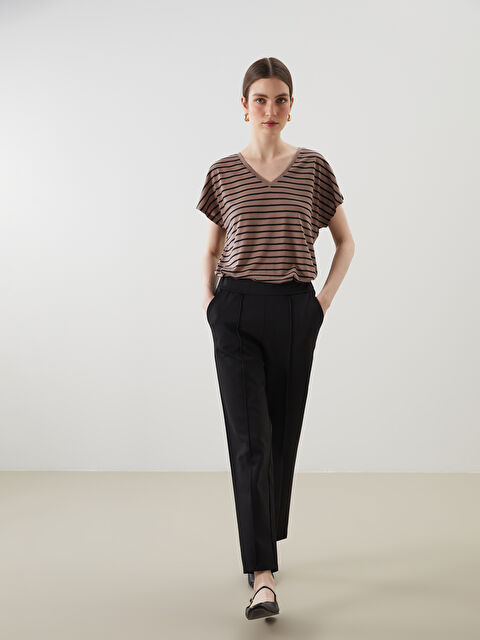 LCWAIKIKI Classic Beli Lastikli Havuç Kesim Kadın Pantolon - S5OD25Z8-CVL