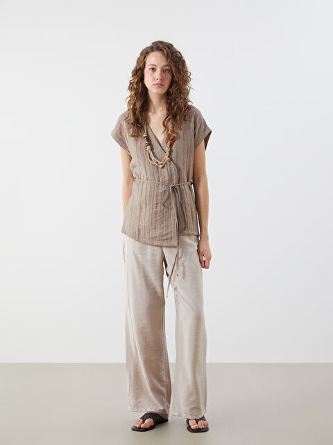 LCWAIKIKI Classic Beli Lastikli Dokulu Geniş Paça Kadın Pantolon - S5OK26Z8-GD0