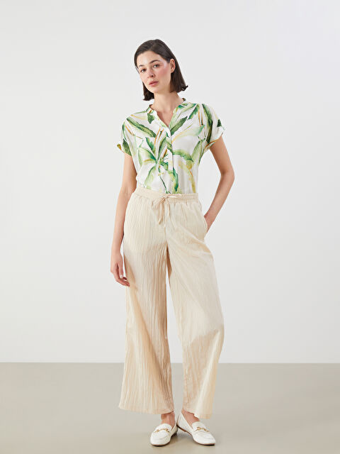 LCWAIKIKI Classic Beli Lastikli Dokulu Geniş Paça Kadın Pantolon - S5RG04Z8-RQH