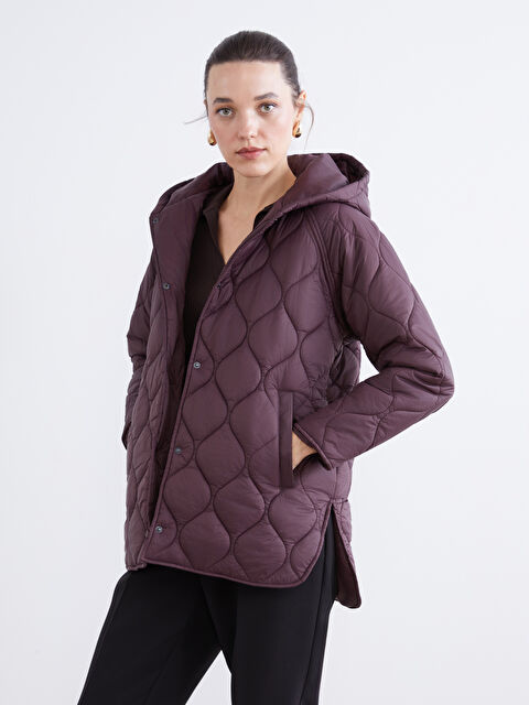 LCWAIKIKI Classic Kapüşonlu Kapitone Oversize Kadın Şişme Mont - W53237Z8-SUC