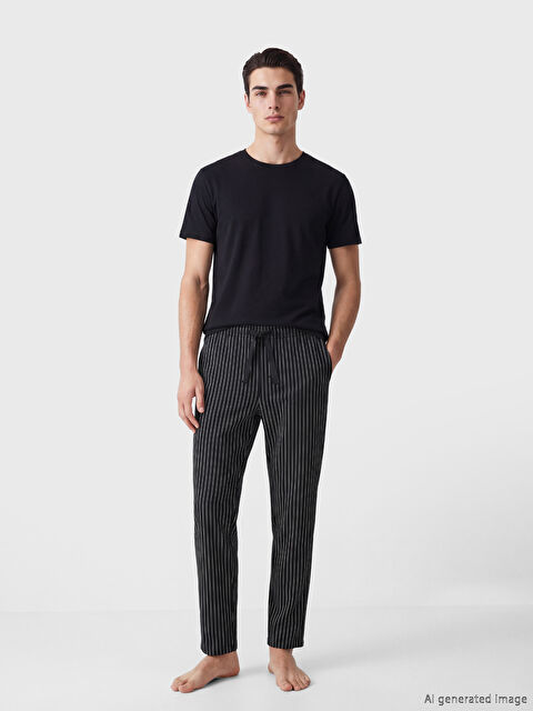 LC WAIKIKI بنطال بيجاما رجالي مخطط بقصة عادية