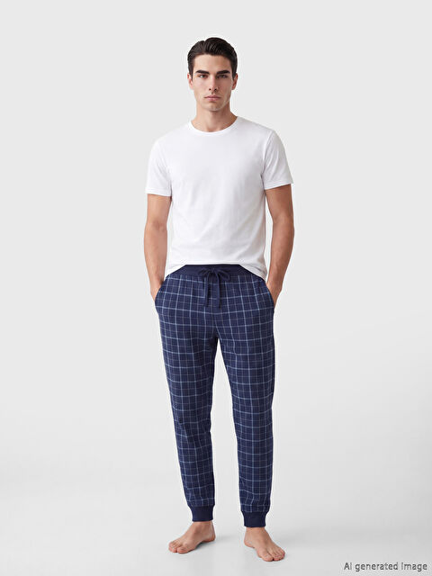 LC WAIKIKI بنطال بيجاما رجالي بقصة عادية بنمط كاروهات