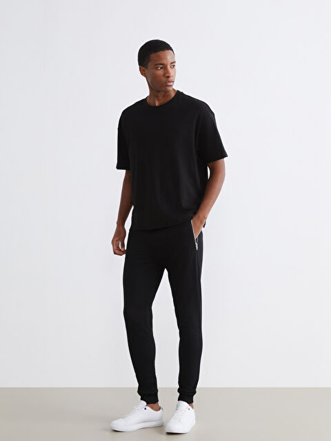 XSIDE Pantalon de survêtement pour Hommes à Coupe Régulière - S68630Z8-CVL