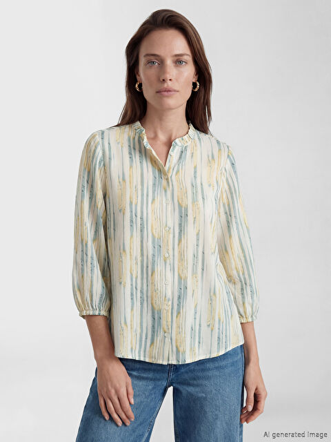 LCW Grace Notch Neck Patterned Blouse