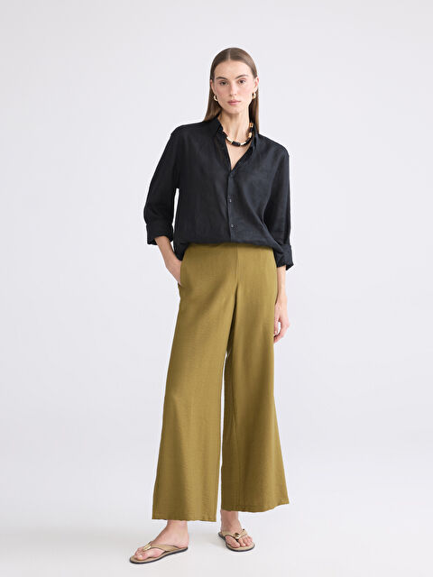 LCWAIKIKI Classic Effortless elegance meets everyday comfort in our wide-leg trousers with a flexible waistband. - S6AP19Z8-SFL