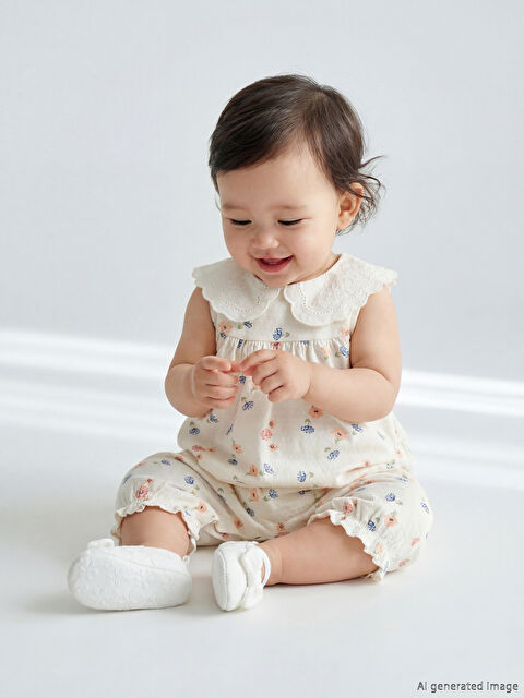 LCW baby Bebe Yaka Çiçekli Kız Bebek Tulum