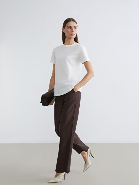 LCW Comfort Bezvremenska elegancija susreće svakodnevnu udobnost u našim pantalonama širokih nogavica sa elastičnim pojasom. - S6CJ51Z8-HMK