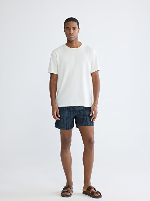 LCW SWIMWEAR شورت سباحة رجالي مطبوع بحروف بخصر مرن