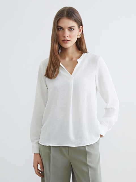 LCWAIKIKI Classic Textured blouse with an asymmetrical neckline. - S6HQ53Z8-R9J