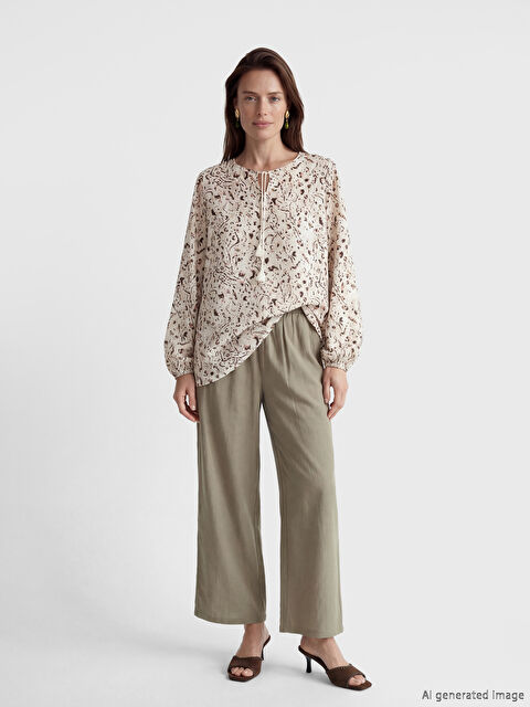 LCW Grace Beli Lastikli Dokulu Saten Kadın Pantolon