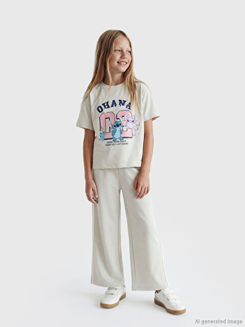 LCW Kids Stitch ve Angel Baskılı Kız Çocuk Tişört ve Eşofman Altı - S6N074Z4-FLG