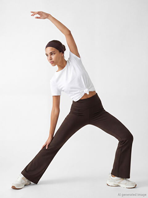 KOOR SPORT Beli Lastikli Ispanyol Paça Kadın Spor Tayt	