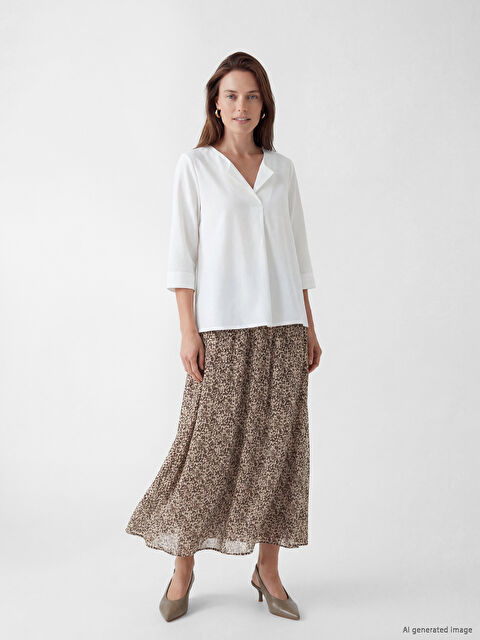 LCW Grace Beli Lastikli Desenli Kloş Etek