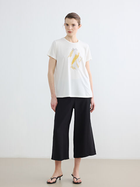 LCWAIKIKI Classic Beli Lastikli Dokulu Kadın Kapri