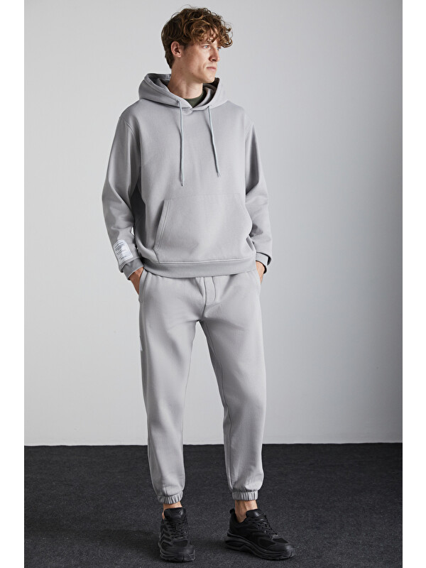 GRIMELANGE ASHBOURNE Erkek Oversize Fit Kanguru Cepli Lastikli Paça Kol Etiket Detaylı GRİ Eşofman Takımı