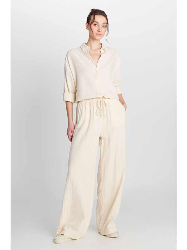 Wrangler %100 Pamuk Regular Fit Geniş Paça Ekru Müslin Desenli Pantolon