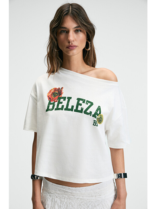 GRIMELANGE QALY Kadın Kayık Yaka Tek Omuz Kısa Kol Ön Ve Arka Baskı Detaylı Relaxed EKRU T-Shirt