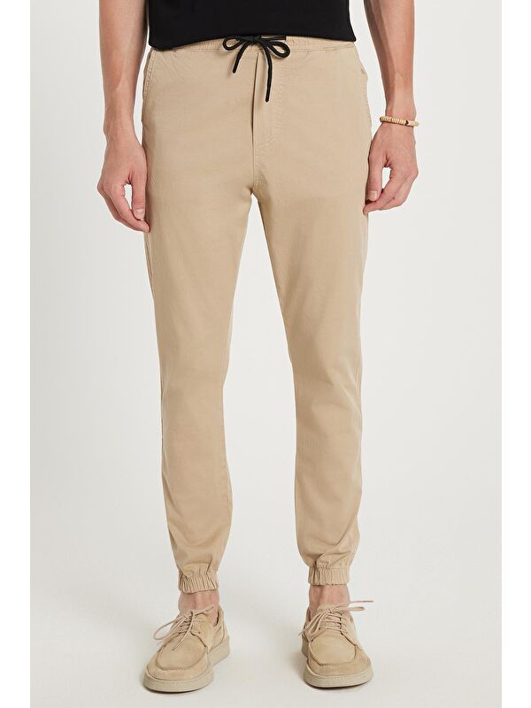 TUDORS Erkek Slim Fit Dar Kesim Pamuklu Normal Bel Lastikli Paça Bej Renk Pantolon