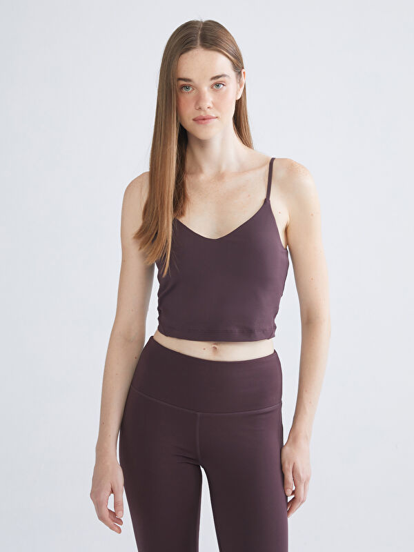 KOOR SPORT کراپ تەوقەدار یاخەی V بۆ ژنان بەدی وەرزشی