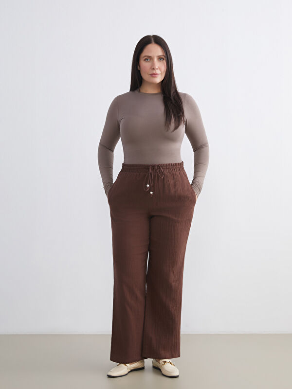 LCWAIKIKI Classic Beli Lastikli Dokulu Müslin Kadın Pantolon