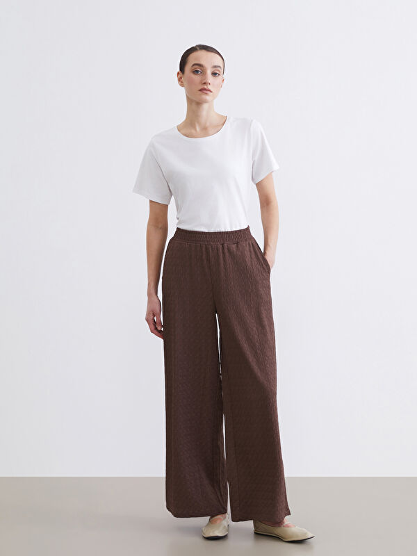 LCW Modest Pantalon texturé à jambes larges pour femmes avec taille élastiquée.